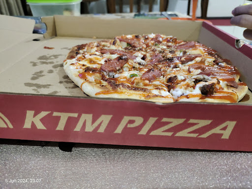 QUE PIZZA-IDAMAN